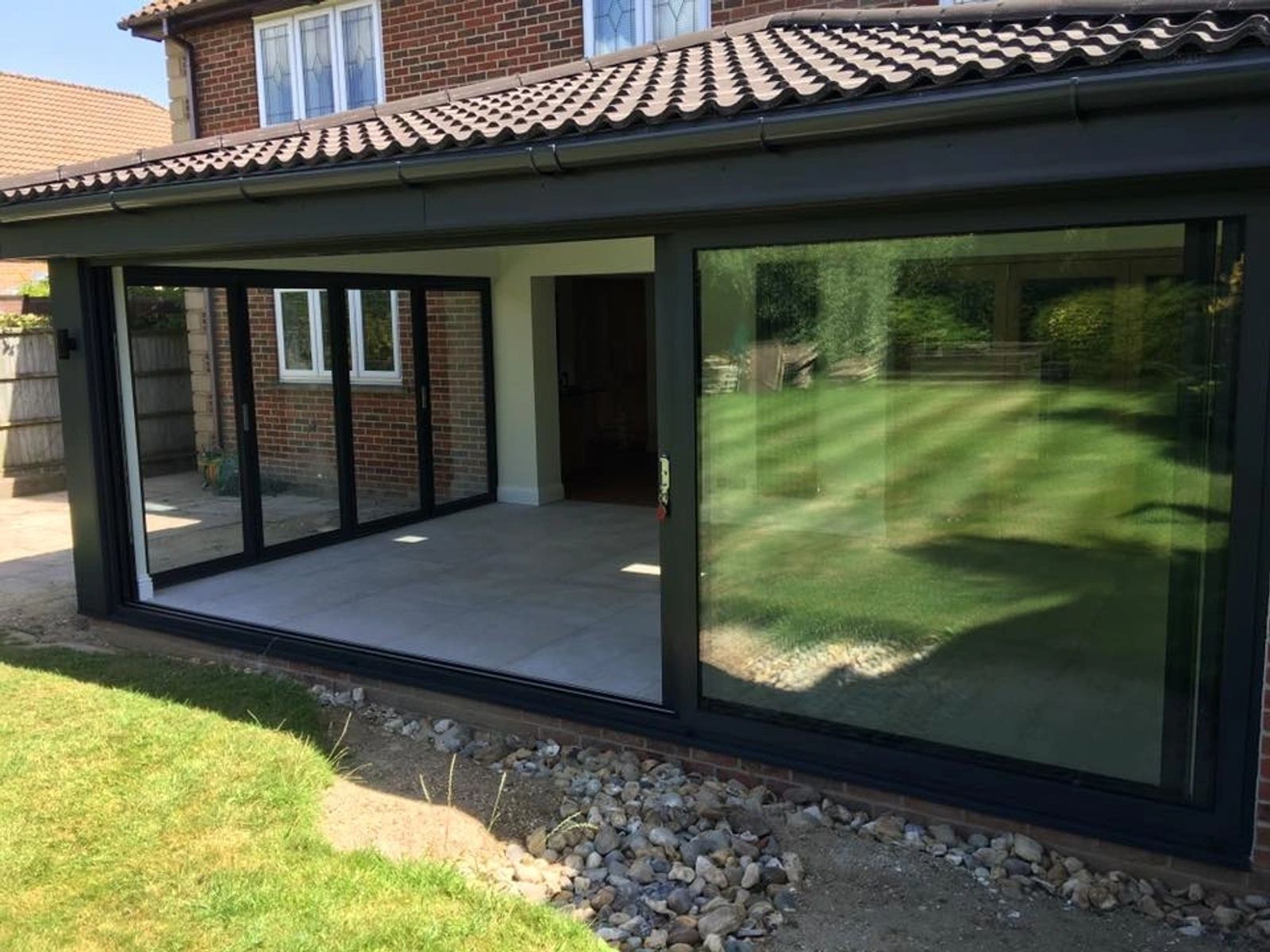 Stunning rear extension with bifold doors and modern patio